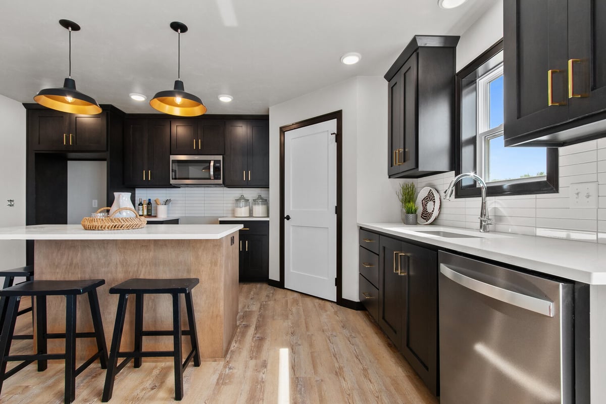 Kitchen layout in Wisconsin custom home by Midwest Design Homes