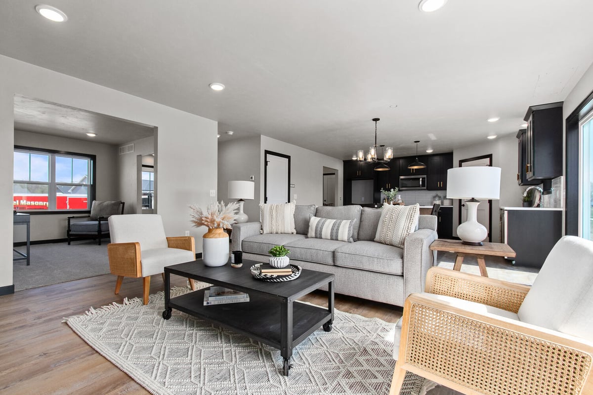 Open living room and kitchen layout by Midwest Design Homes in Kaukauna WI custom home