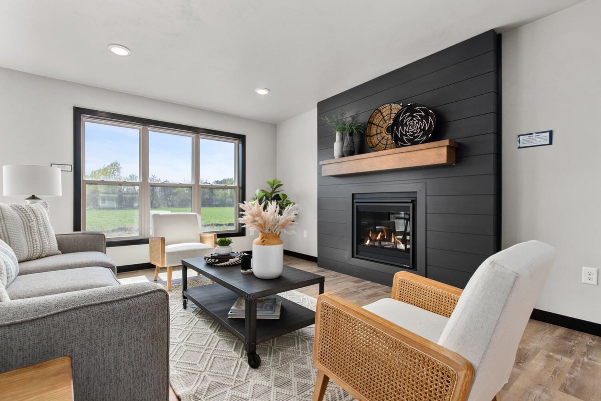 Shiplap fireplace in cozy Kaukauna WI custom home by Midwest Design Homes