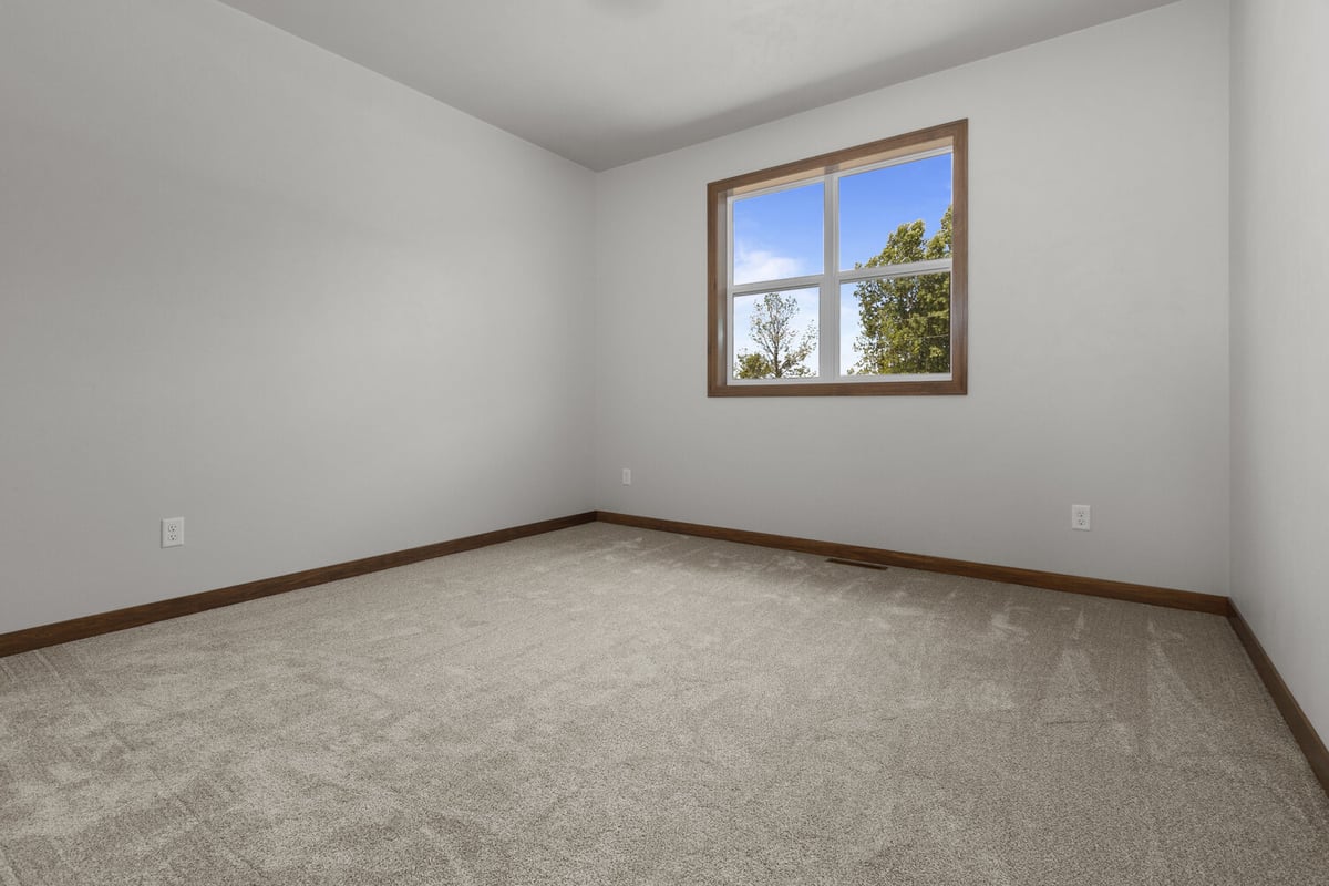 Custom bedroom in new Wisconsin home built by Midwest Design Homes
