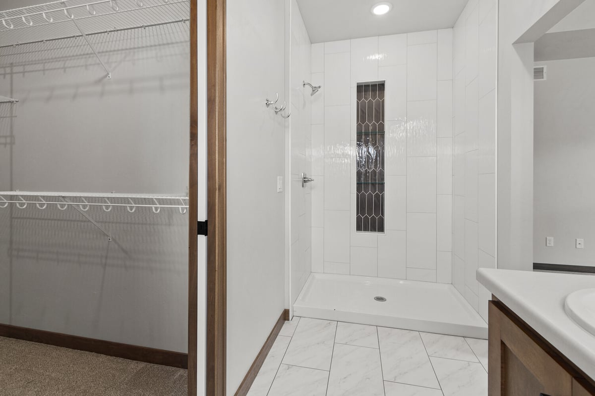 Custom tiled shower in Kaukauna WI home by Midwest Design Homes
