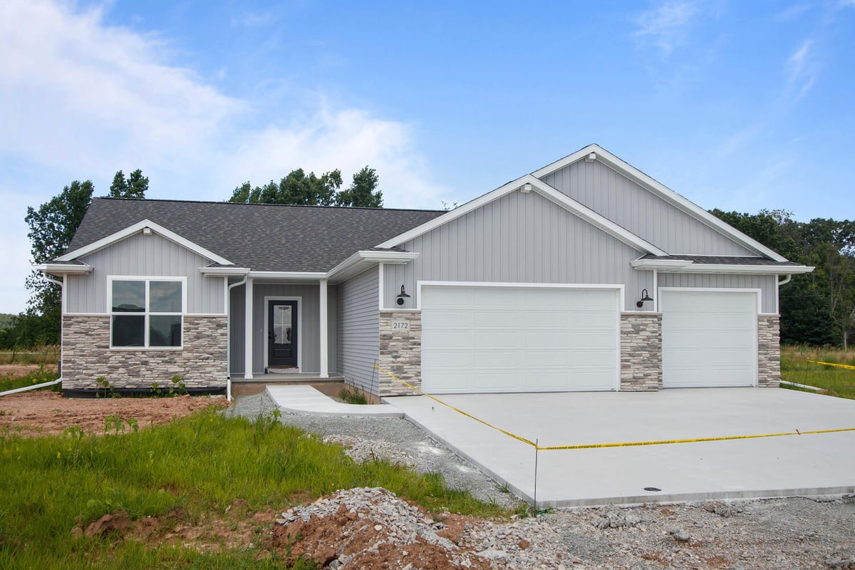 Custom-built home with stone accents by Midwest Design Homes in Kaukauna WI
