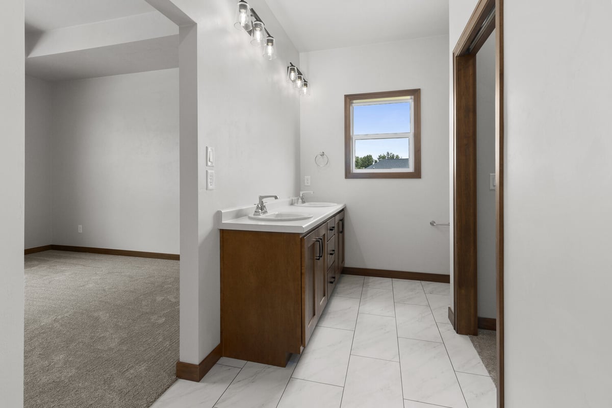 Double vanity master bathroom in Appleton WI by Midwest Design Homes