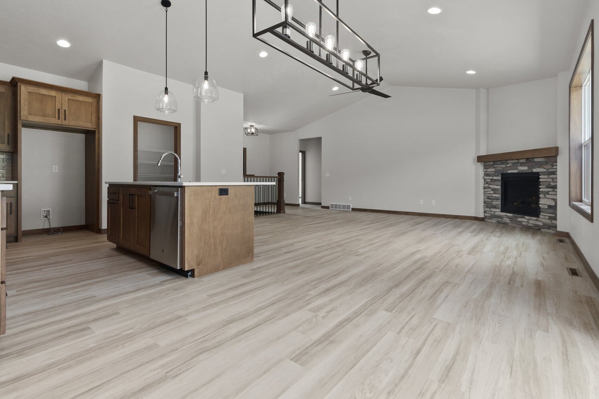 Large open-concept living area in Kaukauna WI custom home by Midwest Design Homes