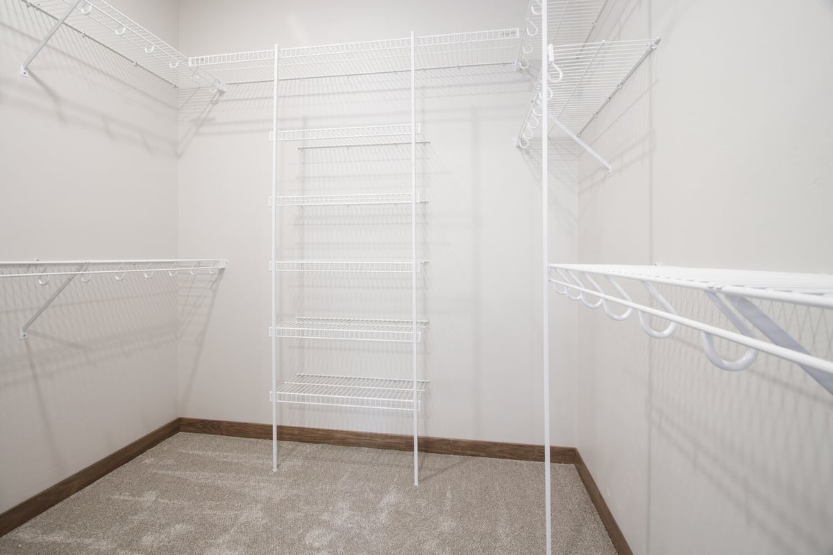Walk-in closet in Kaukauna WI custom home by Midwest Design Homes
