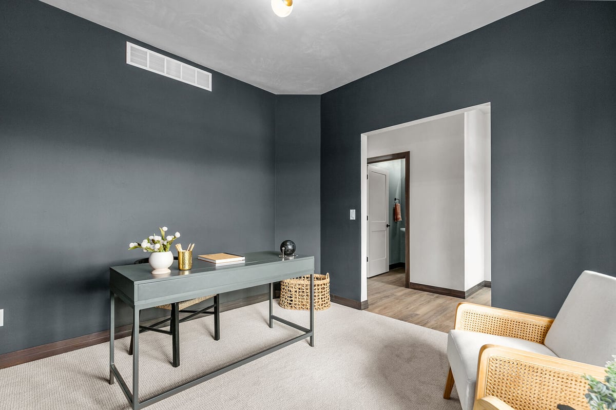 Midwest Design Homes’ custom office in Neenah, WI with carpet and stylish decor