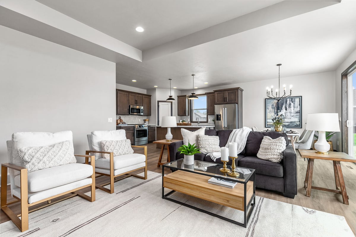 Open living area with kitchen and seating by Midwest Design Homes in Fox Cities, WI