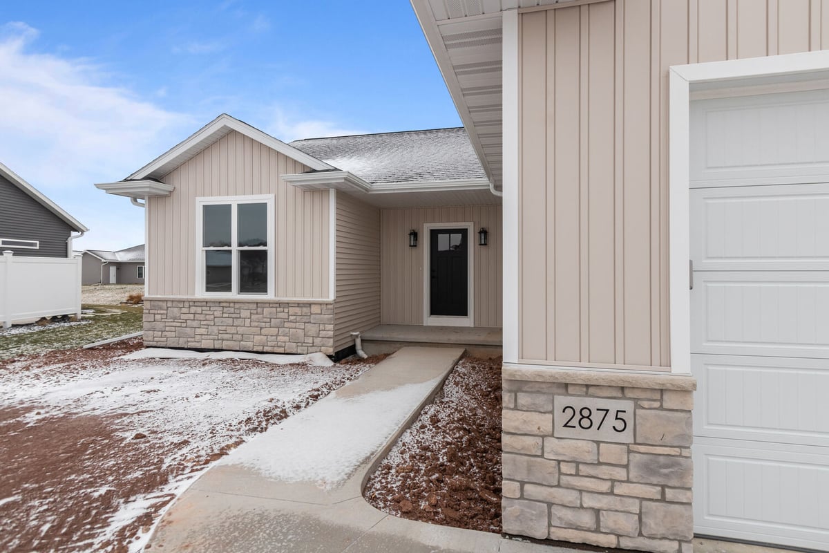 Front entryway view of Midwest Design Homes custom build in Lawrence, WI