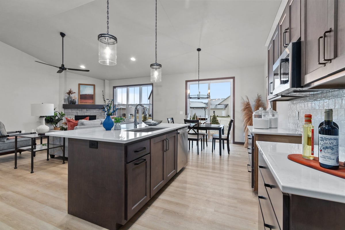 Kitchen sink and dining room view in custom home by Midwest Design Homes, Fox Cities WI