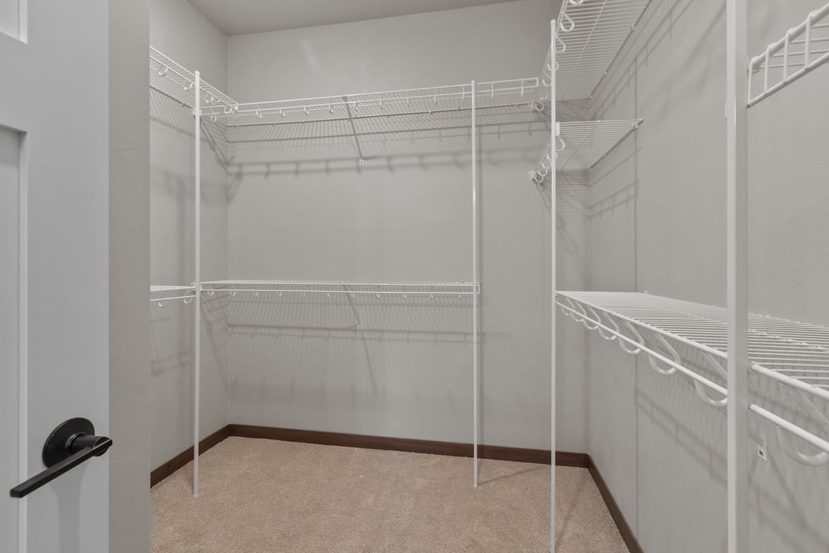 Spacious closet with wire shelving in a custom-built home in the Fox Cities by Midwest Desi