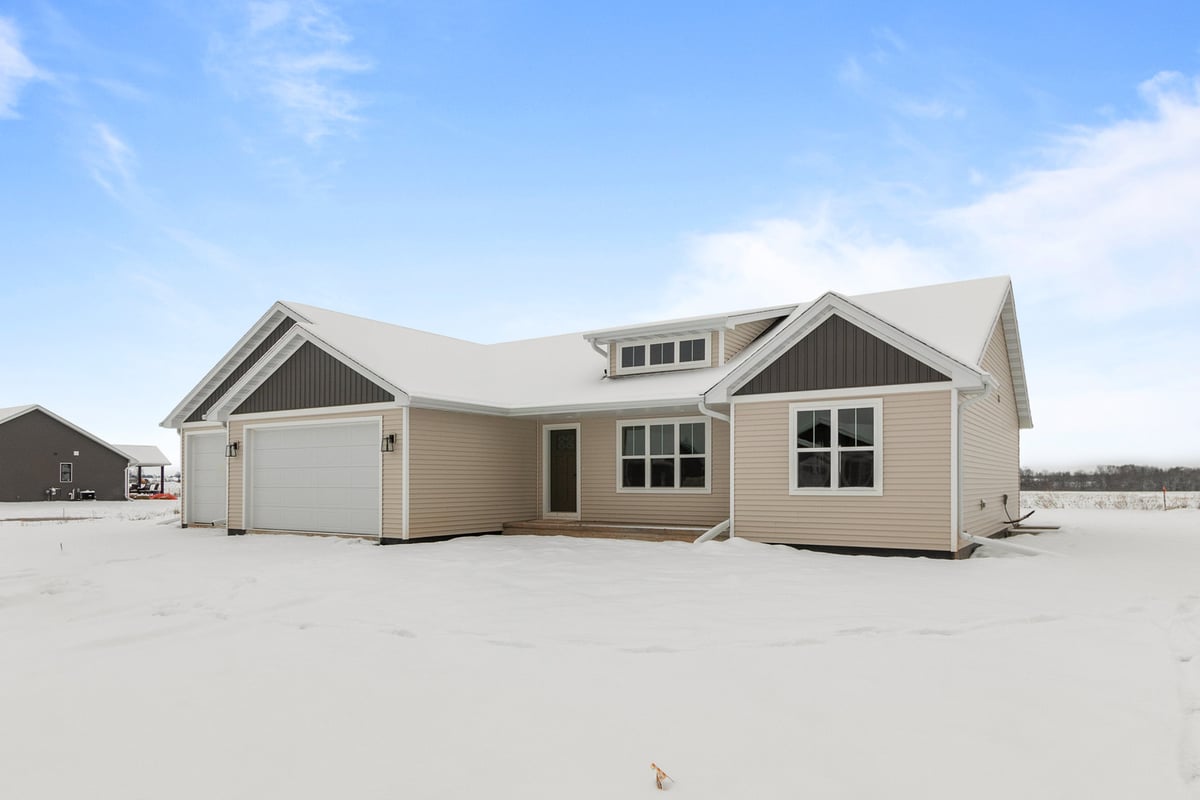 Angled front view of a custom home by Midwest Design Homes in Kaukauna, WI and nearby areas