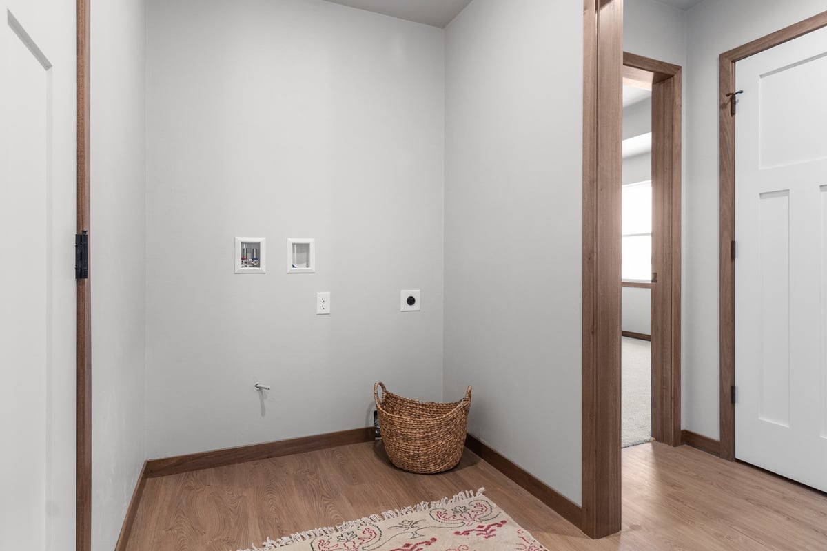 Laundry hook-up area in custom Kaukauna, WI home by Midwest Design Homes