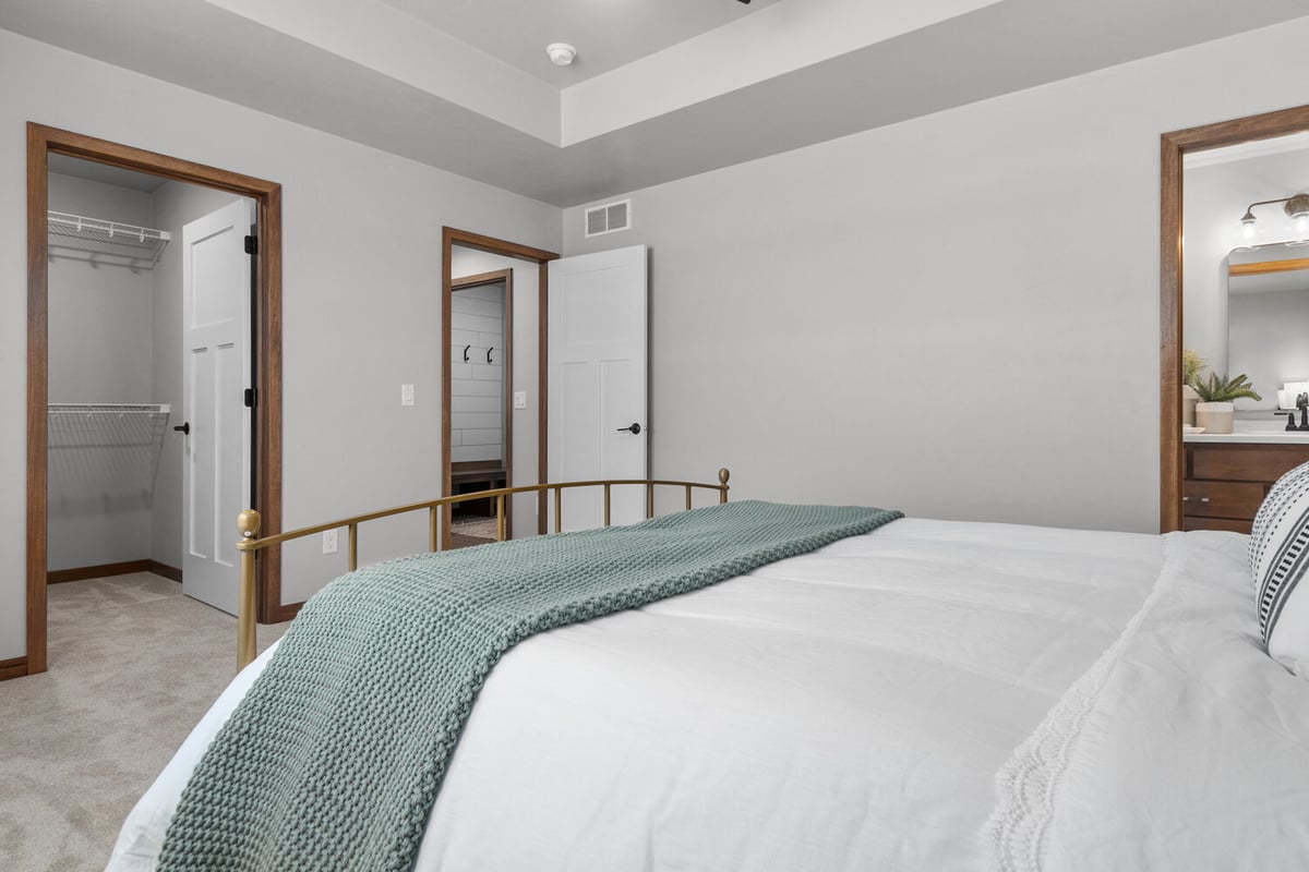 Master bedroom with closet and ensuite by Midwest Design Homes in Kaukauna, WI