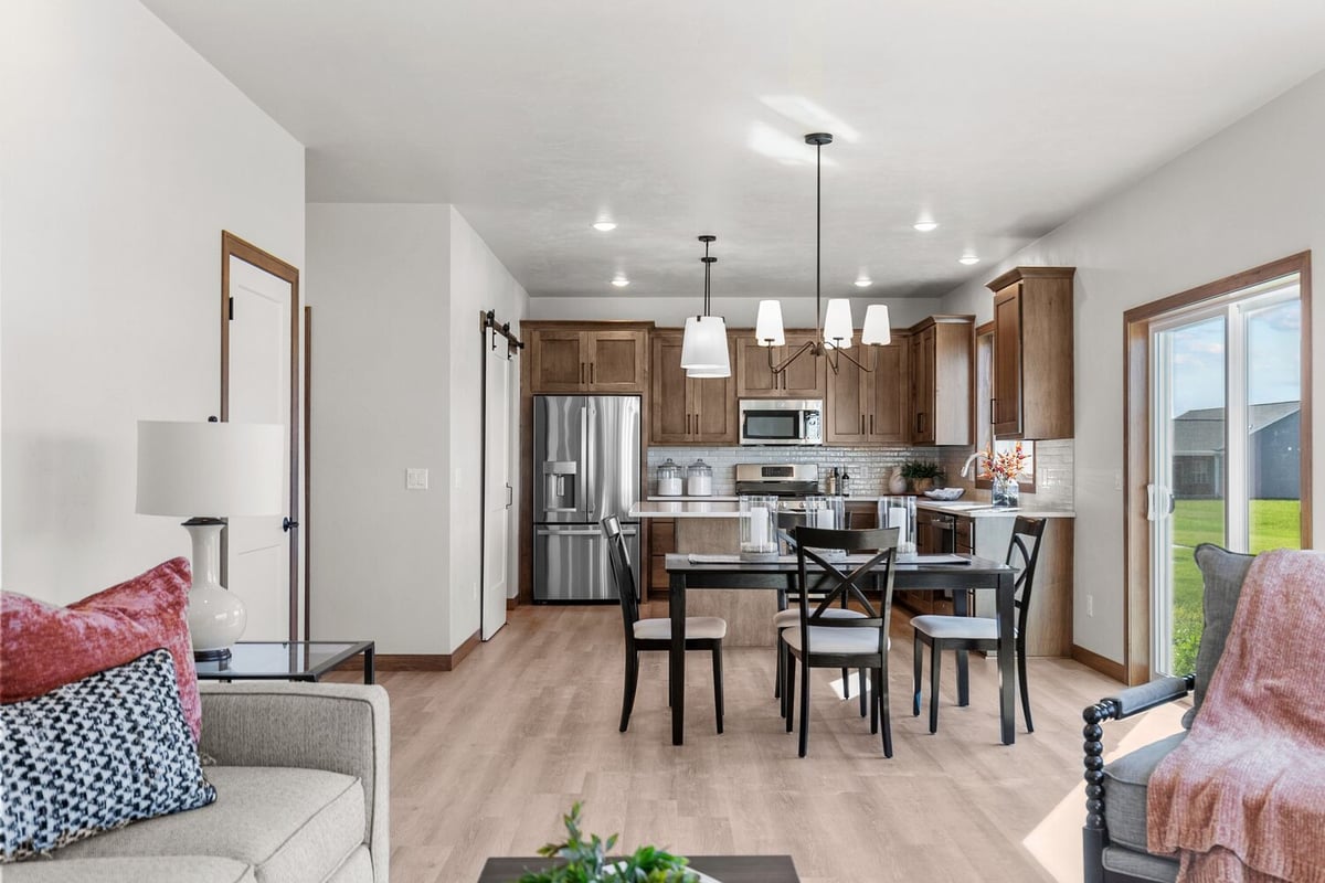 Open living and dining area in custom home by Midwest Design Homes in Neenah, WI