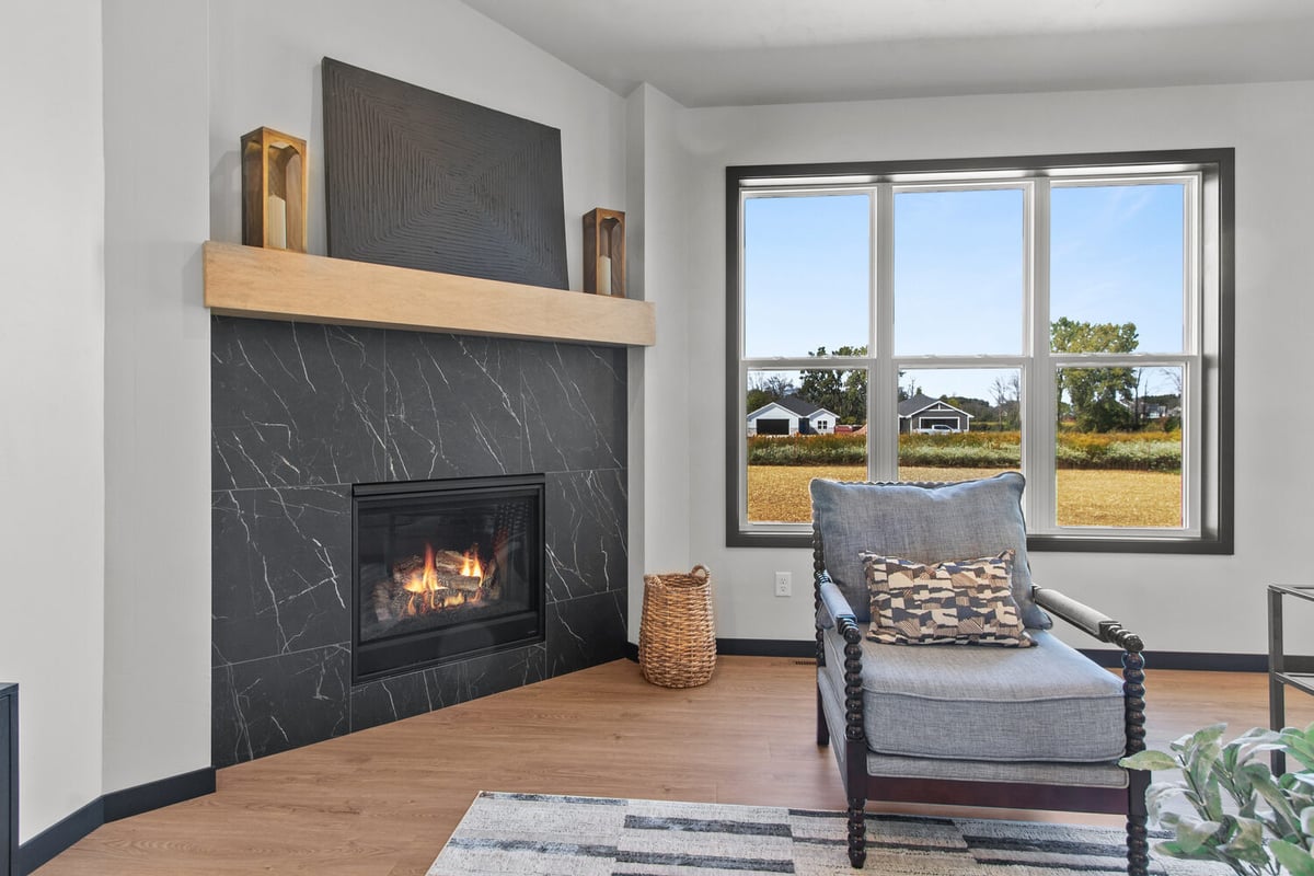 Custom fireplace corner with scenic view by Midwest Design Homes in Neenah, WI