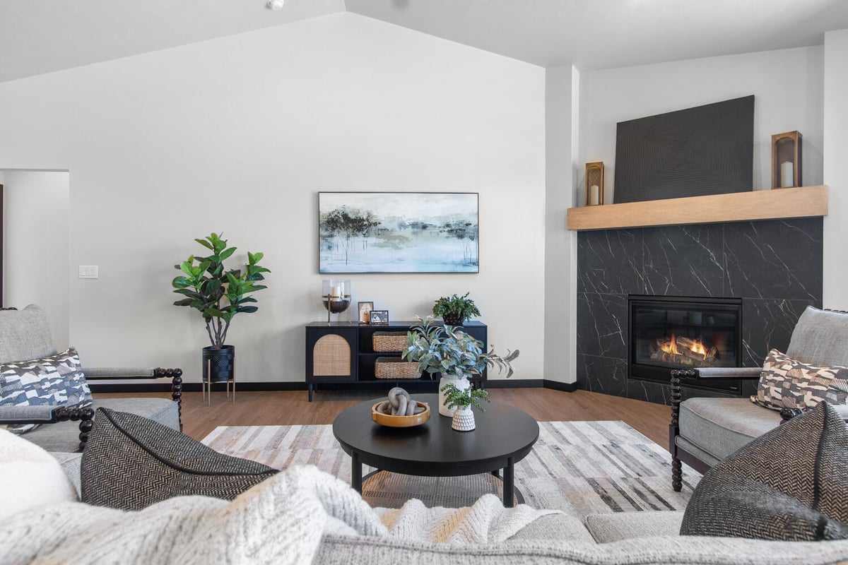 Fireplace and seating in open concept by Midwest Design Homes in Fox Cities, WI