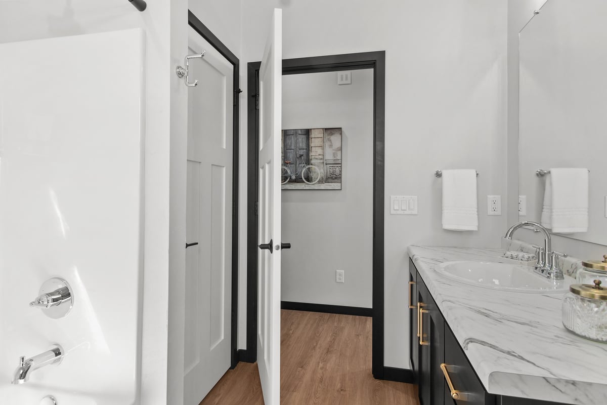 Secondary bathroom entry and vanity by Midwest Design Homes in Fox Cities, WI