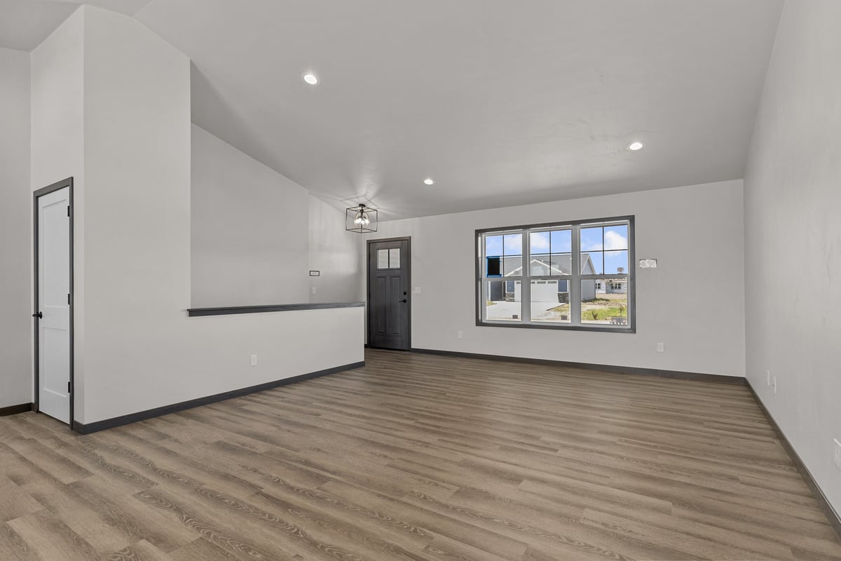 Large living room with natural light in a Kaukauna, WI custom home