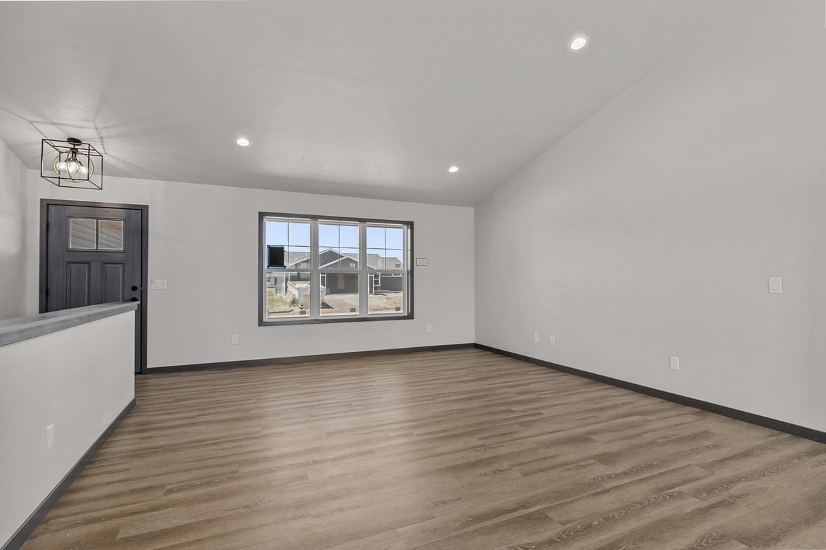 Open concept living room in custom Kaukauna, WI home by Midwest Design Homes