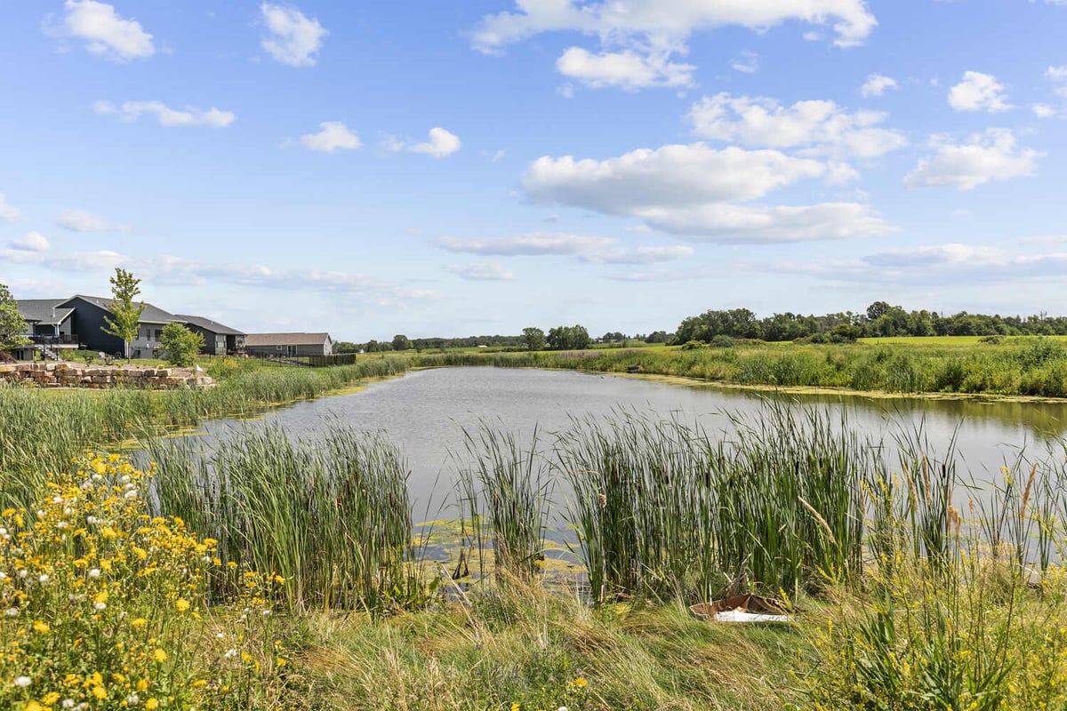 Scenic view of community pond near custom homes by Midwest Design Homes in WI