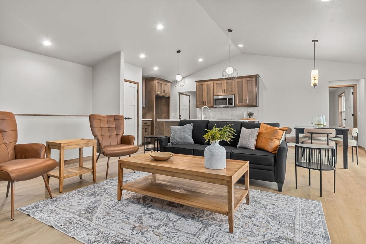 Custom living room with modern lighting by Midwest Design Homes in Green Bay, WI