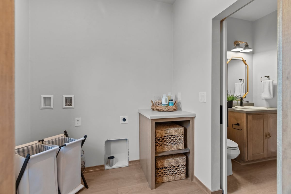 Custom laundry room with storage by Midwest Design Homes in Kaukauna WI and Fox Cities WI