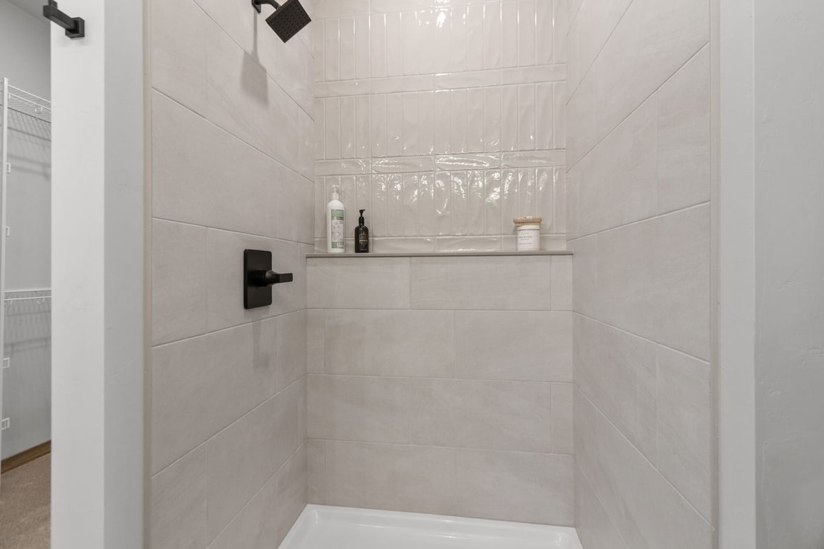 Walk-in shower with tile by Midwest Design Homes in Neenah WI and De Pere WI