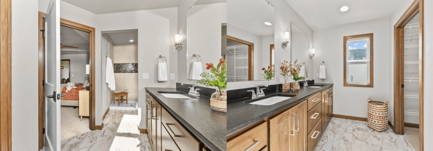 Spacious Fox Cities primary bathroom with dual sinks, natural wood cabinetry, tiled walk-in shower, and marble-look flooring