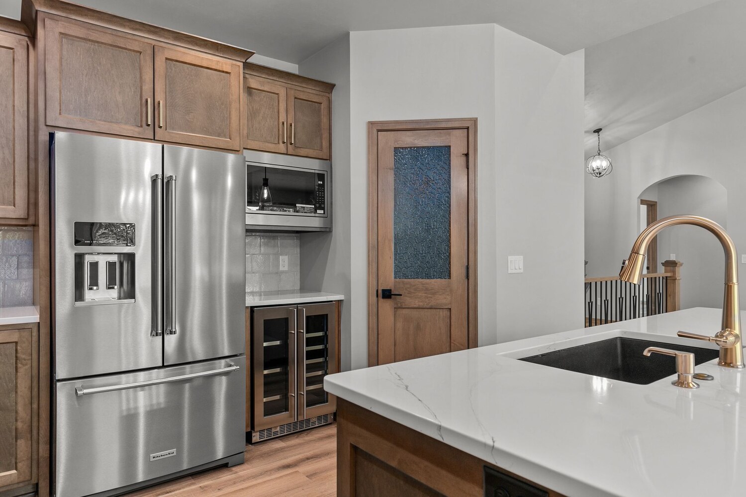 Stainless appliances and walk-in pantry in custom home by Midwest Design Homes, Wisconsin Stainless appliances and walk-in pantry in custom home by Midwest Design Homes, Wisconsin
