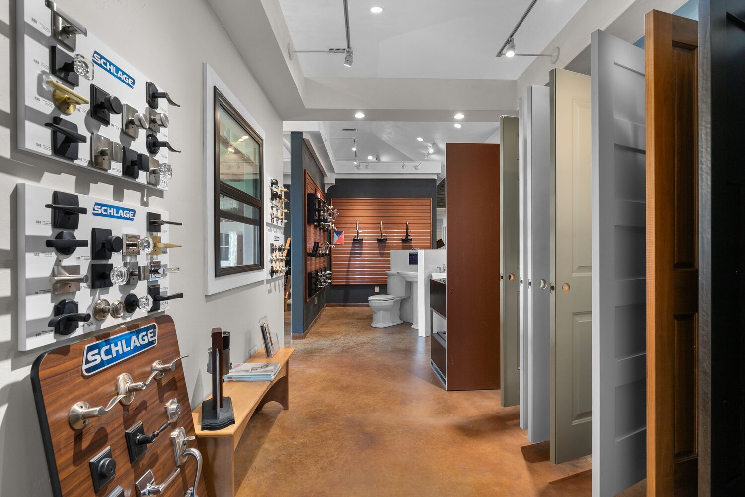 Door and hardware displays in Midwest Design Homes custom home showroom, WI